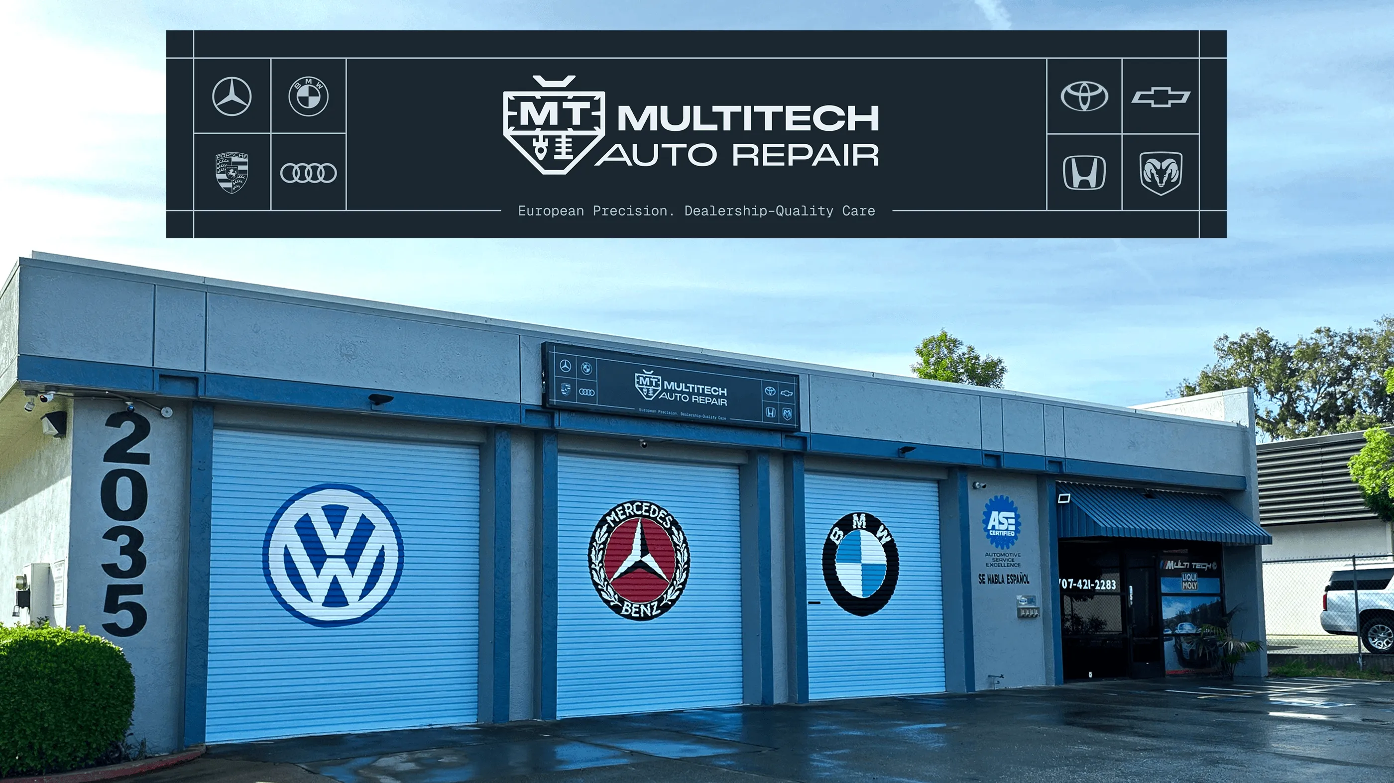 Multitech Auto Repair storefront signage next to European car brand logos